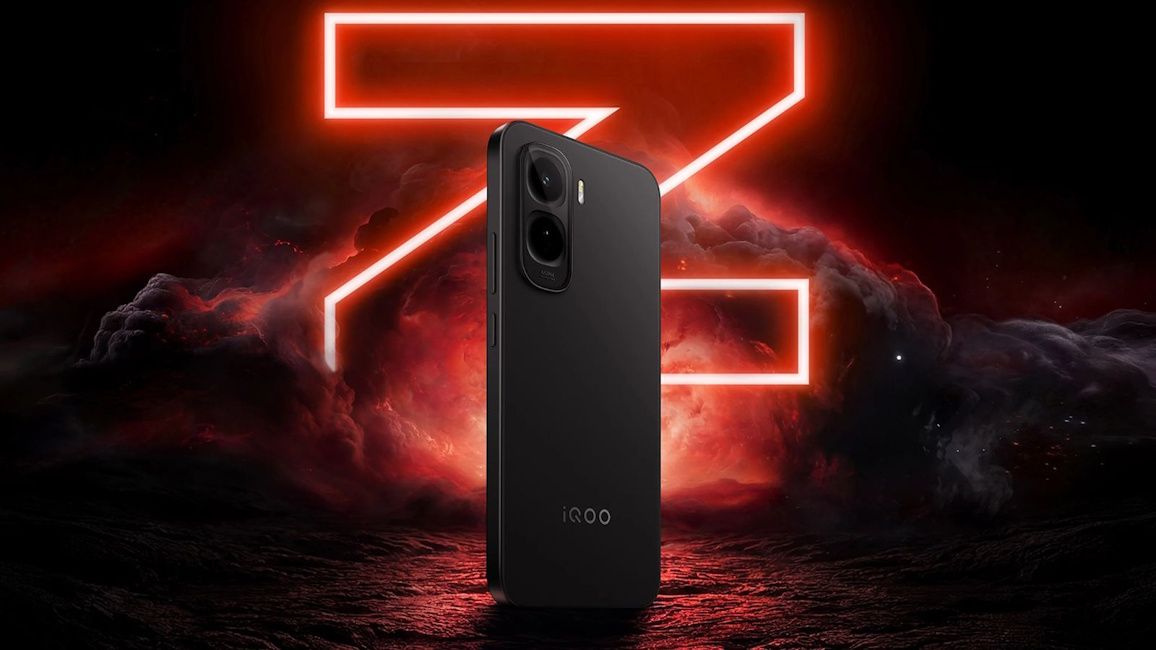 Shot of iQOO Z11 with a large red neon coloured "Z" in the background and dark waves