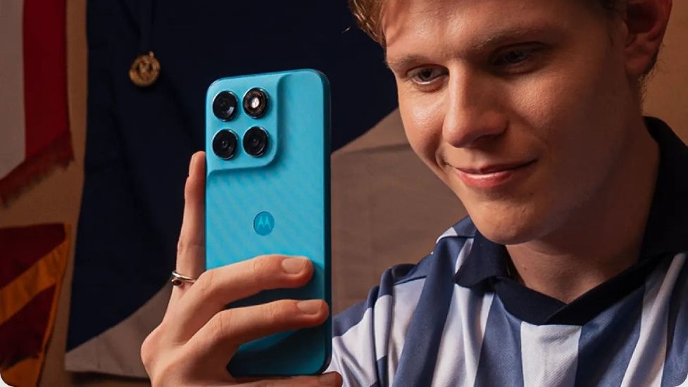 Motorola G Max in blue colourway from the back held in hand Motorola G Max in blue colourway from the back held in hand
