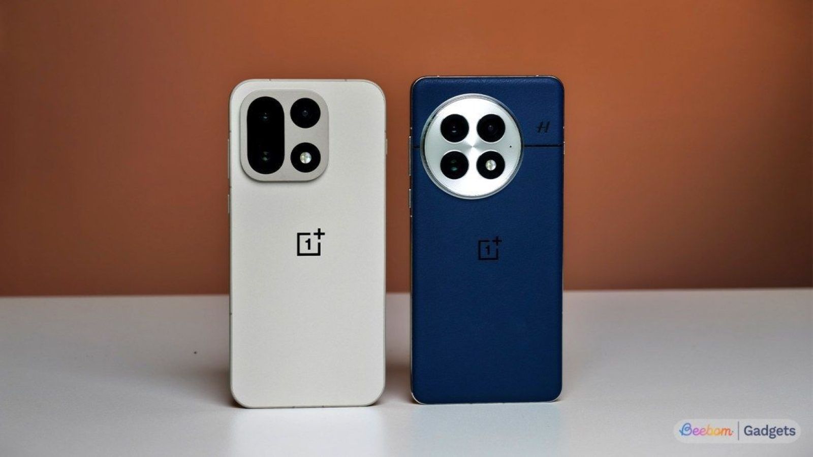 OnePlus 15 and 13 from the back on a table