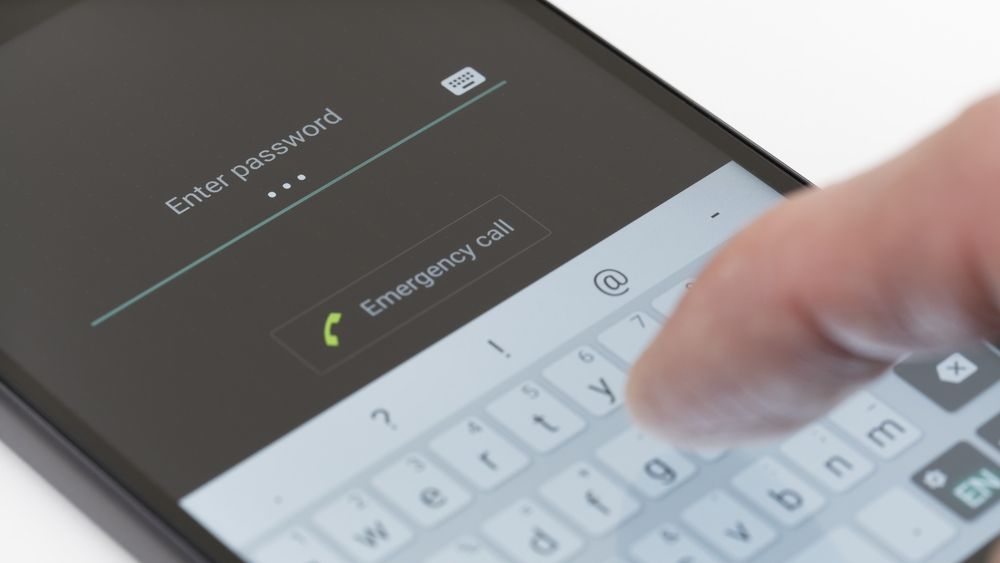 a user entering password on an android phone