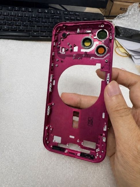iPhone 18 Pro Max Cherry Red Aluminum frame in hand 