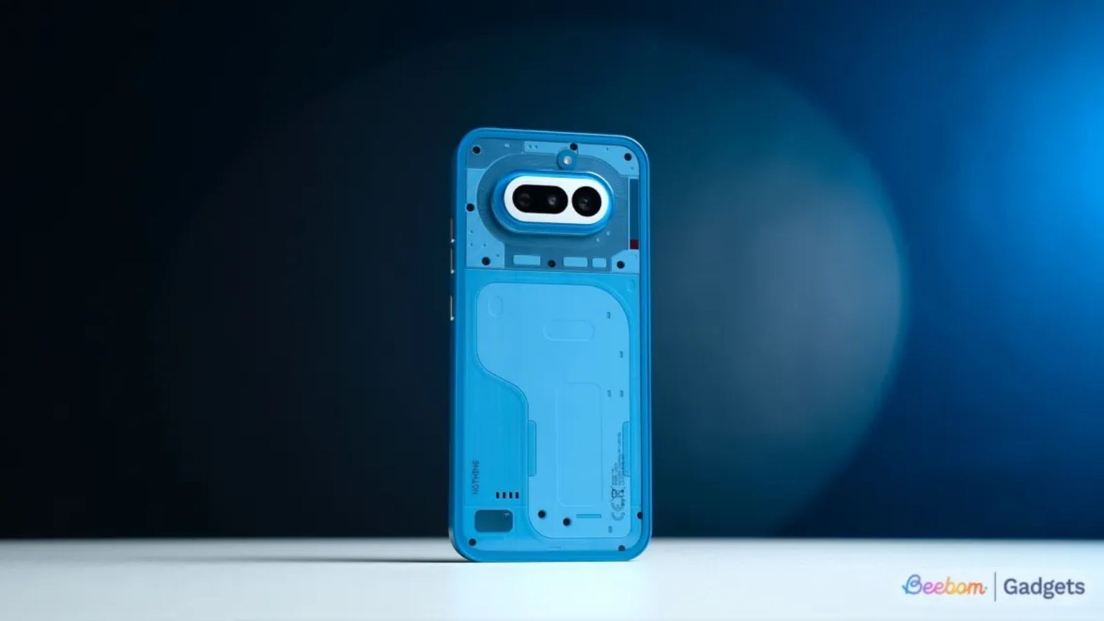 Nothing Phone 4a from the back in blue colour Nothing Phone 4a from the back in blue colour