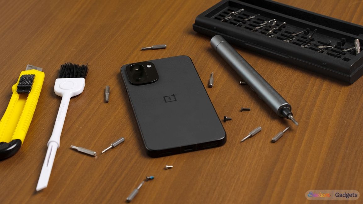 shot of a OnePlus phone placed face down on a table in the process of getting repaired