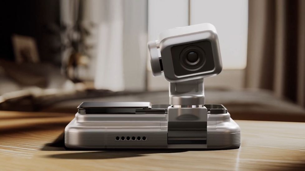 Honor Robot Gimbal smartphone laying flat with a camera popped up Honor Robot Gimbal smartphone laying flat with a camera popped up
