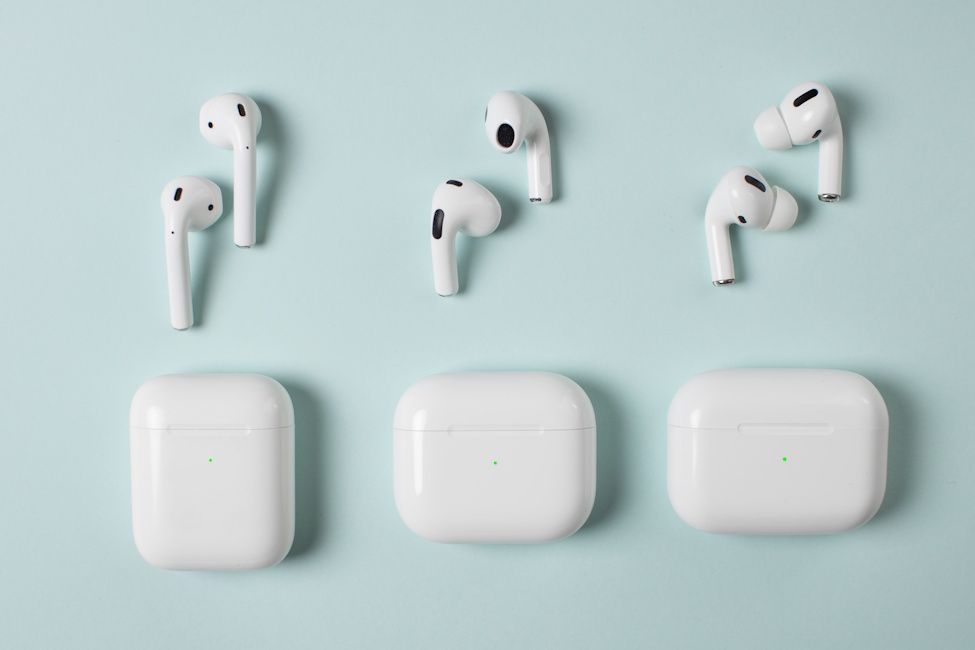 Different types and generations of AirPods places side by side Different types and generations of AirPods places side by side