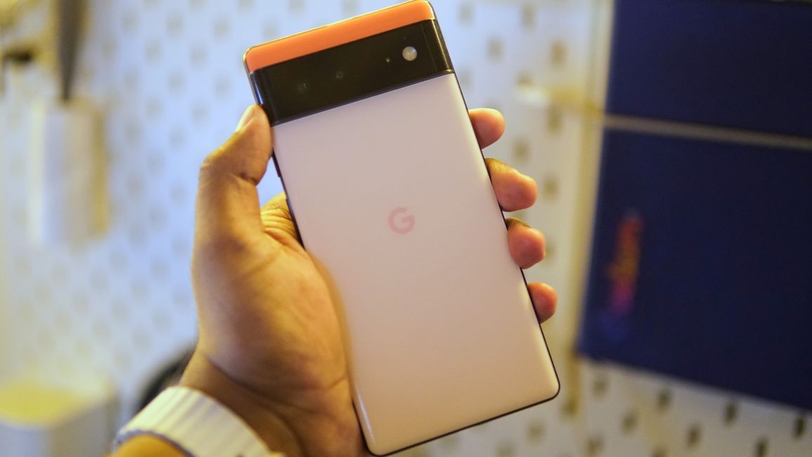 Pixel 6a smartphone from the back in coral colourway Pixel 6a smartphone from the back in coral colourway