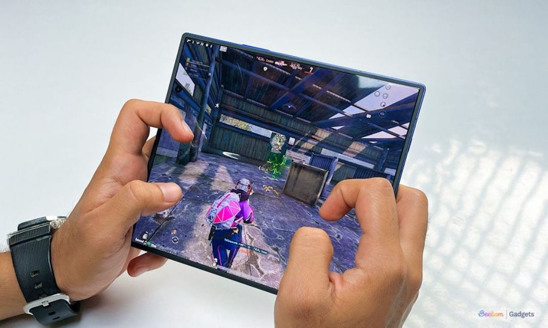 Samsung Galaxy Z Fold 7 with the inner display showing BGMI gameplay 