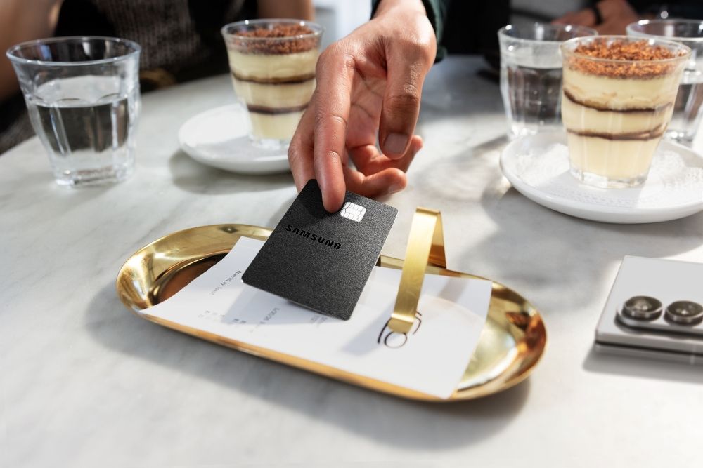 Galaxy Card metal credit card design showcased while in hand