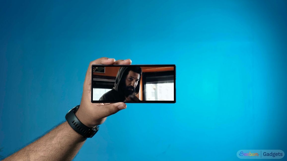 shot of the Galaxy Z Fold 8 Ultra held horizontally in hand while watching a movie
