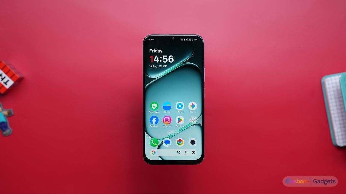 OnePlus N6x home screen displayed with the phone on a red background