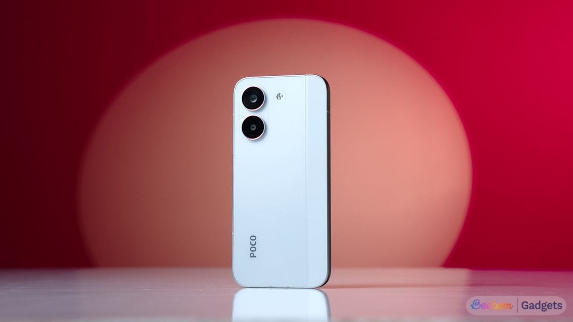 Poco X8 Pro smartphone in white colourway from the back standing