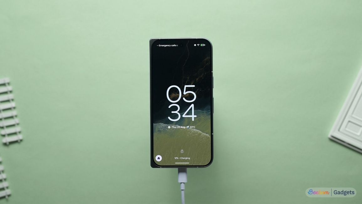 Pixel 11 Pro Fold plugged in with the charging screen displayed on the cover screen