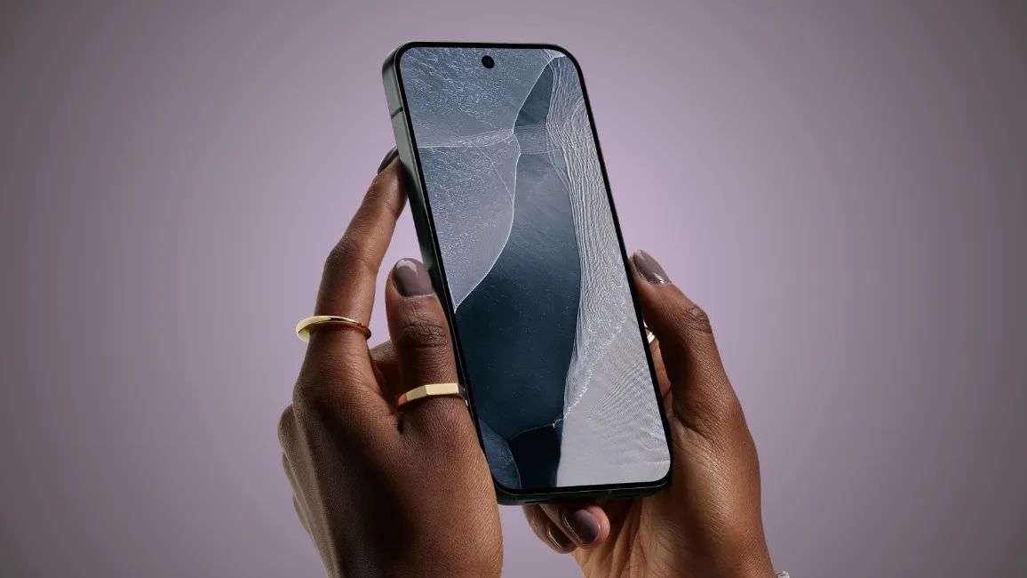 someone holding pixel 11 and showing its display 