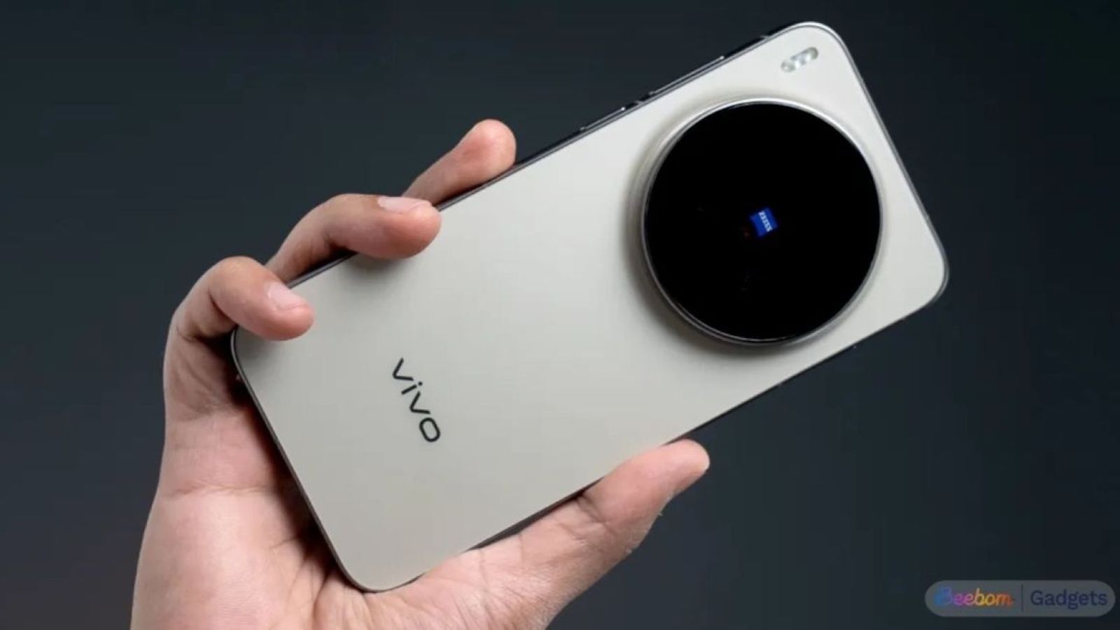 Vivo X300 Pro smartphone from the back held in hand Vivo X300 Pro smartphone from the back held in hand