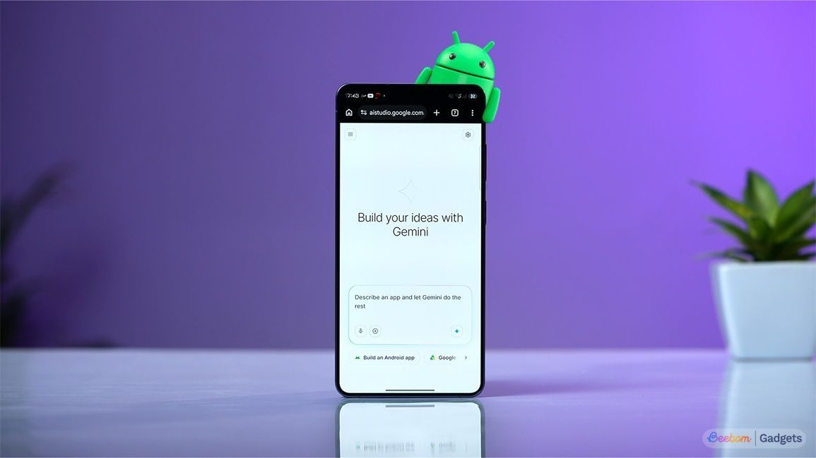 ai studio website open on an android phone with an android mascot around the corner ai studio website open on an android phone with an android mascot around the corner