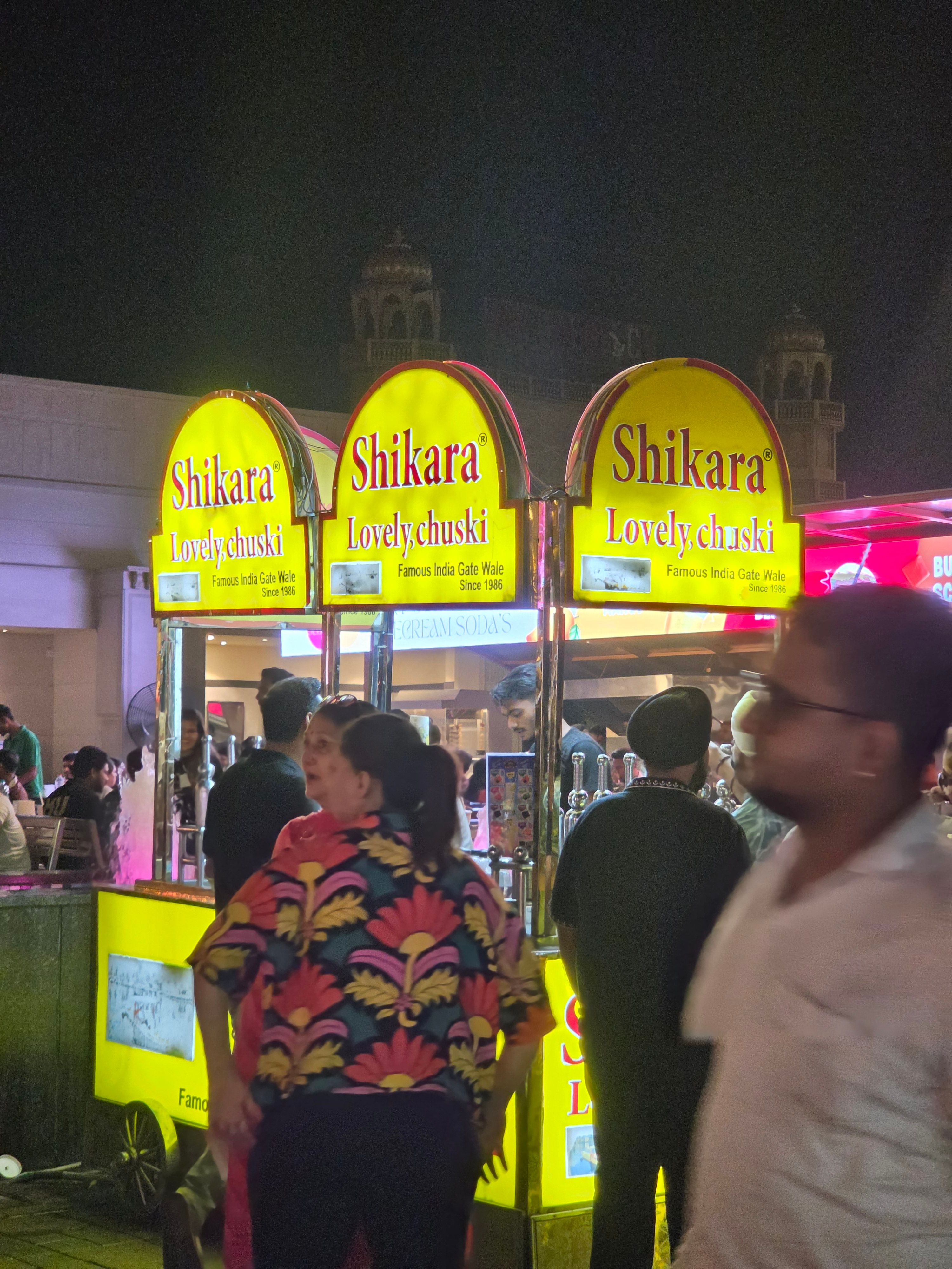 Galaxy Z Fold 8 Ultra street shop night time telephoto shot