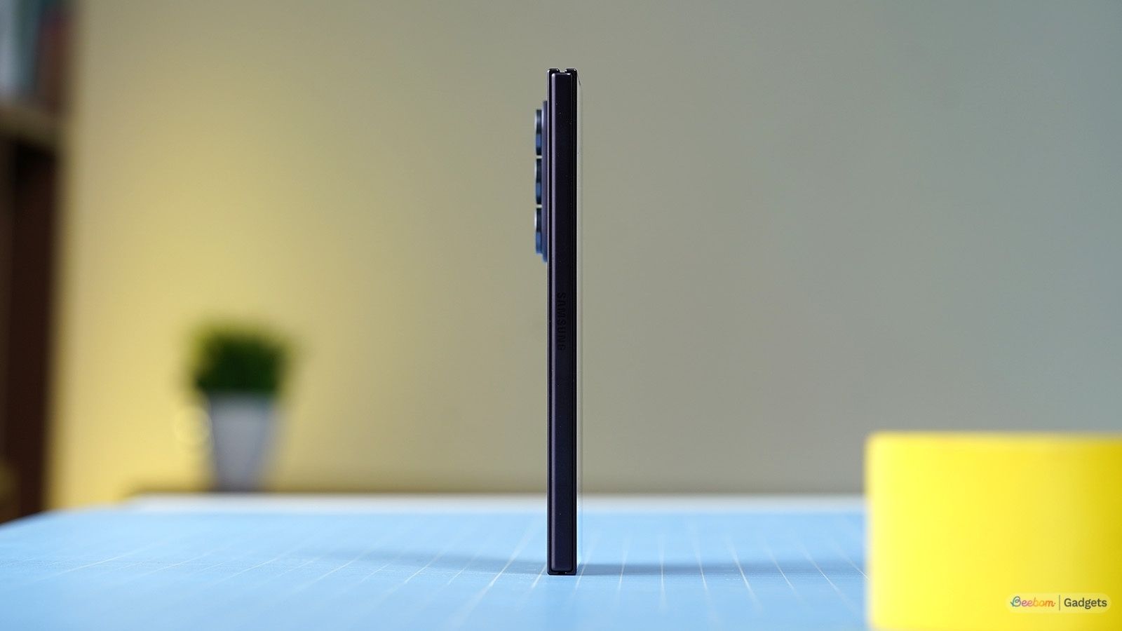Galaxy Z Fold 8 Ultra thickness showcased from the side while it's standing upright on a table