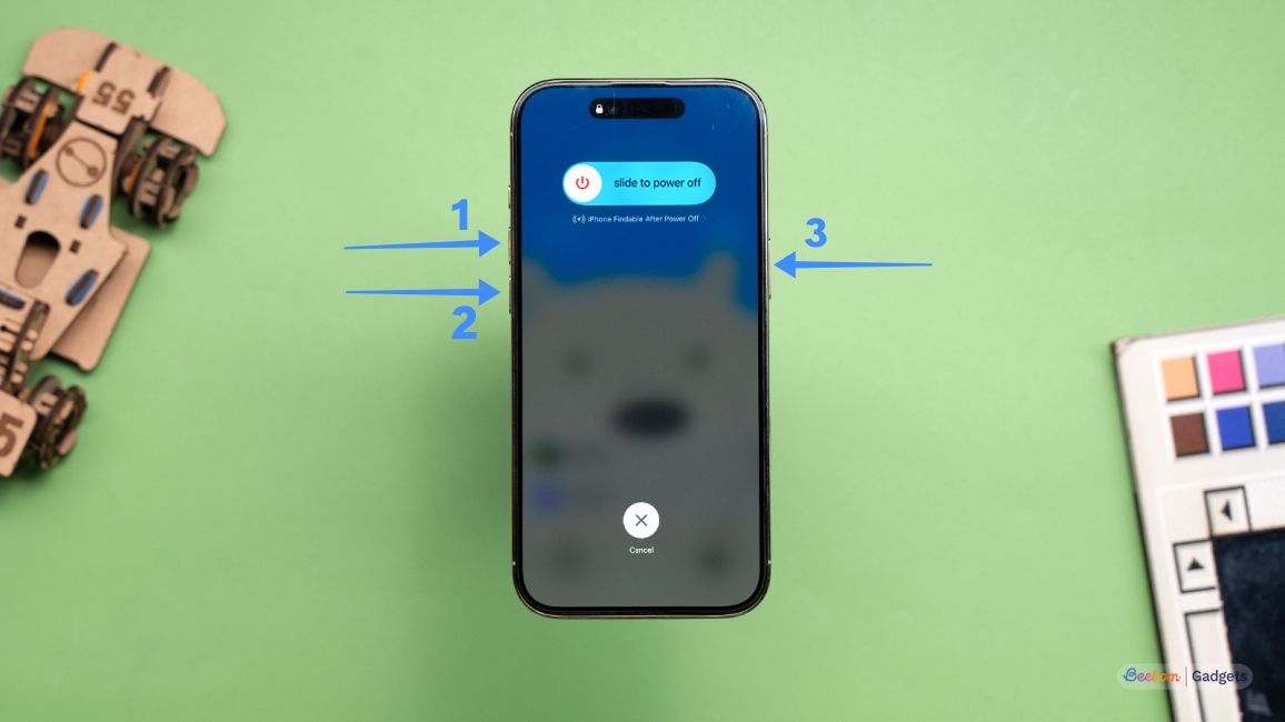 iPhone Air on a green background with blue annotation arrows pointing towards its buttons iPhone Air on a green background with blue annotation arrows pointing towards its buttons