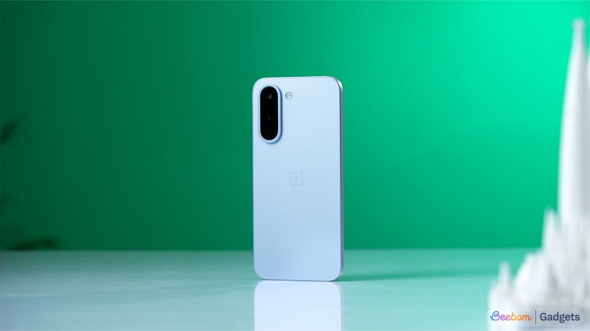 OnePlus N6x box content laid out on a red background