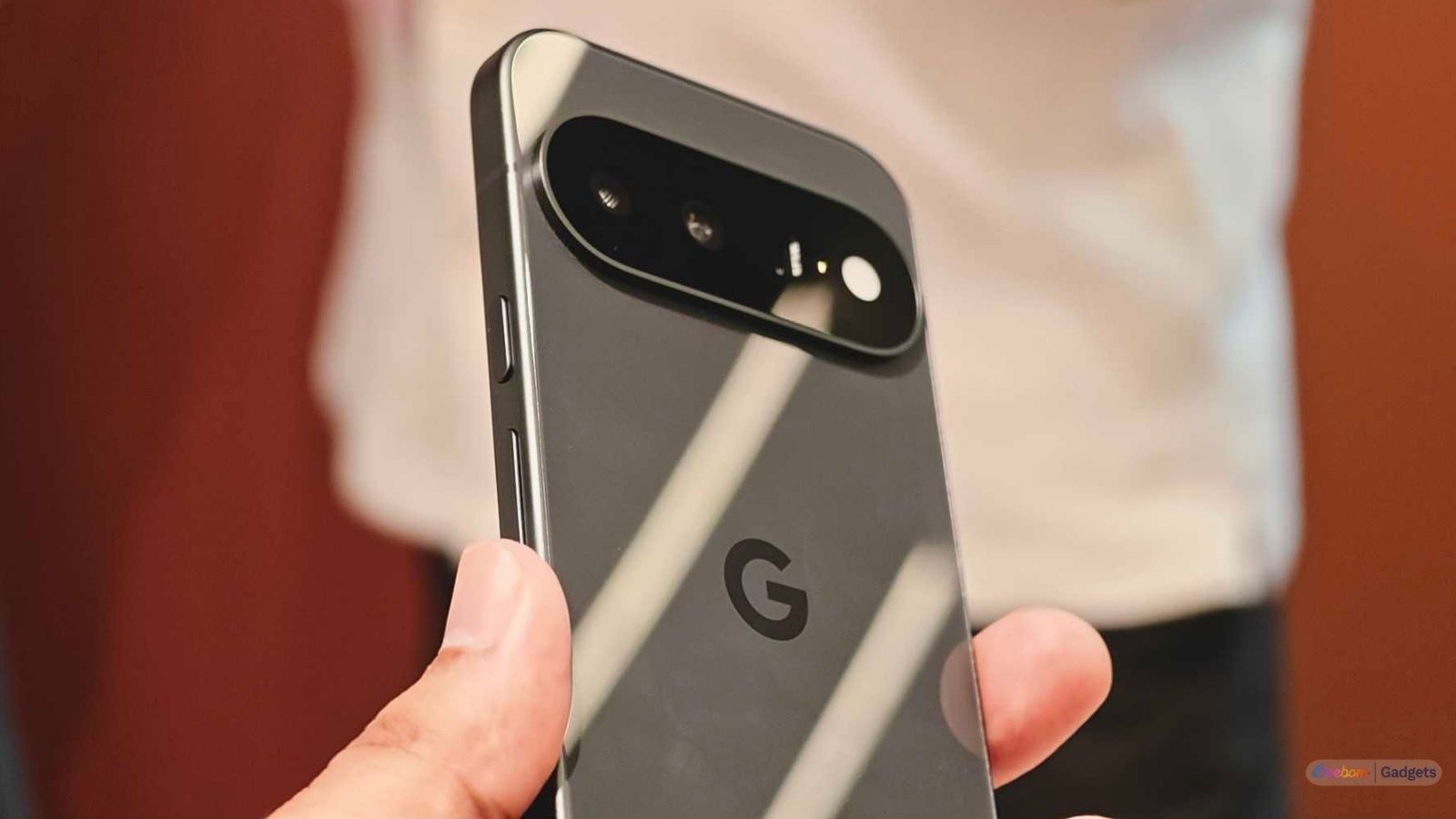 Pixel 11 in hand Obsidian design showcased
