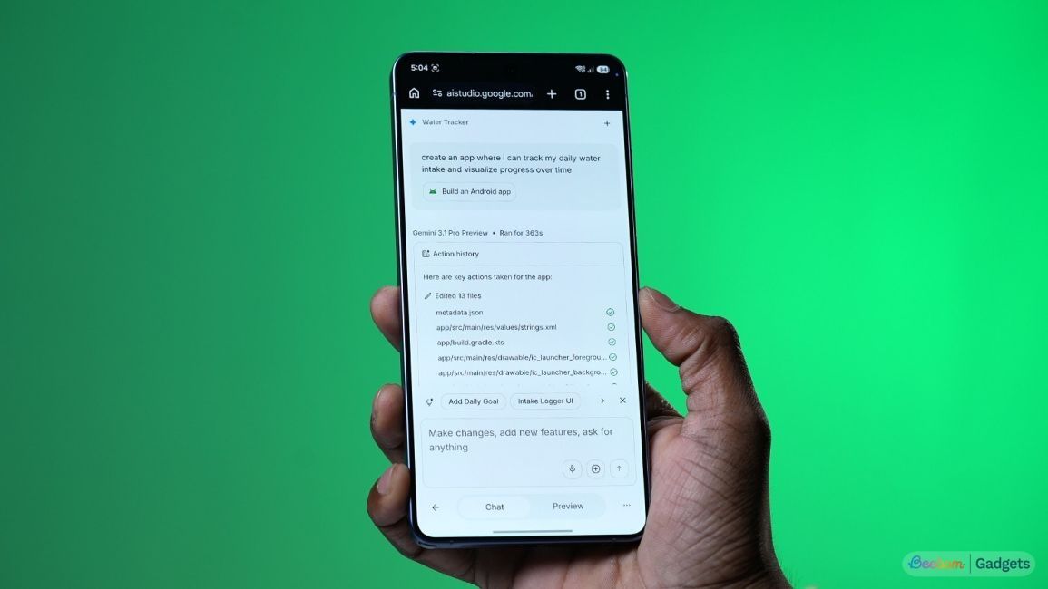 a user holding an android phone showing ai studio website on screen a user holding an android phone showing ai studio website on screen