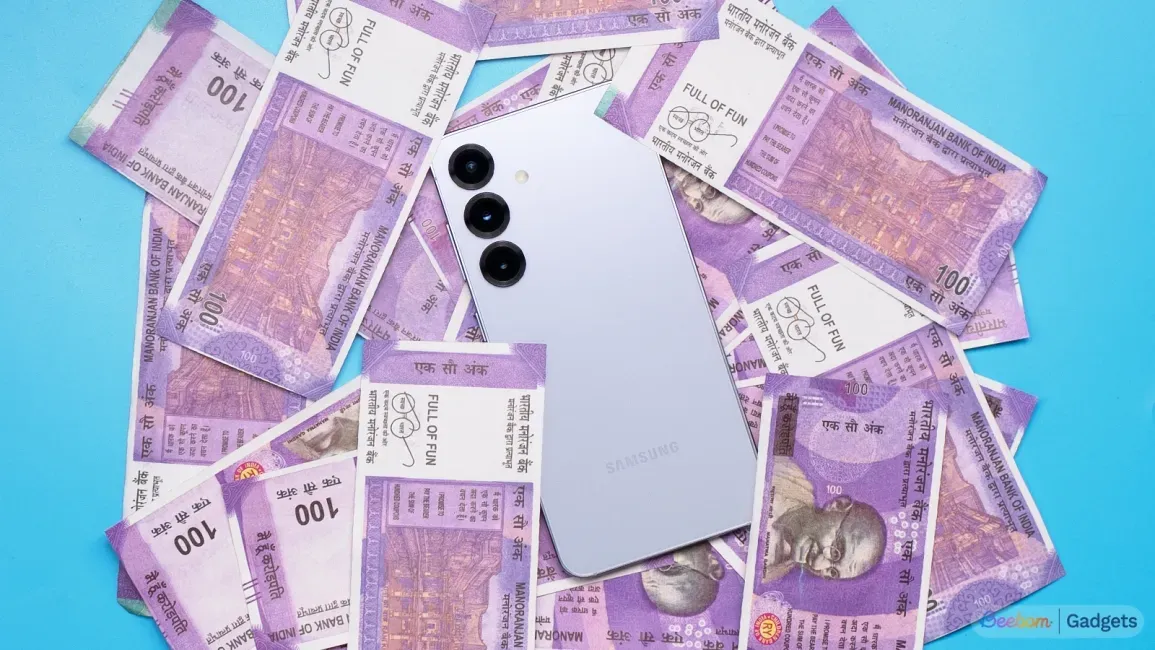 Samsung Galaxy phone shown amidst several Rs 100 notes