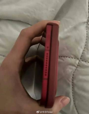 Xiaomi 18 Fold red top-down view showcasing the speaker grille with a colour-matched case attached