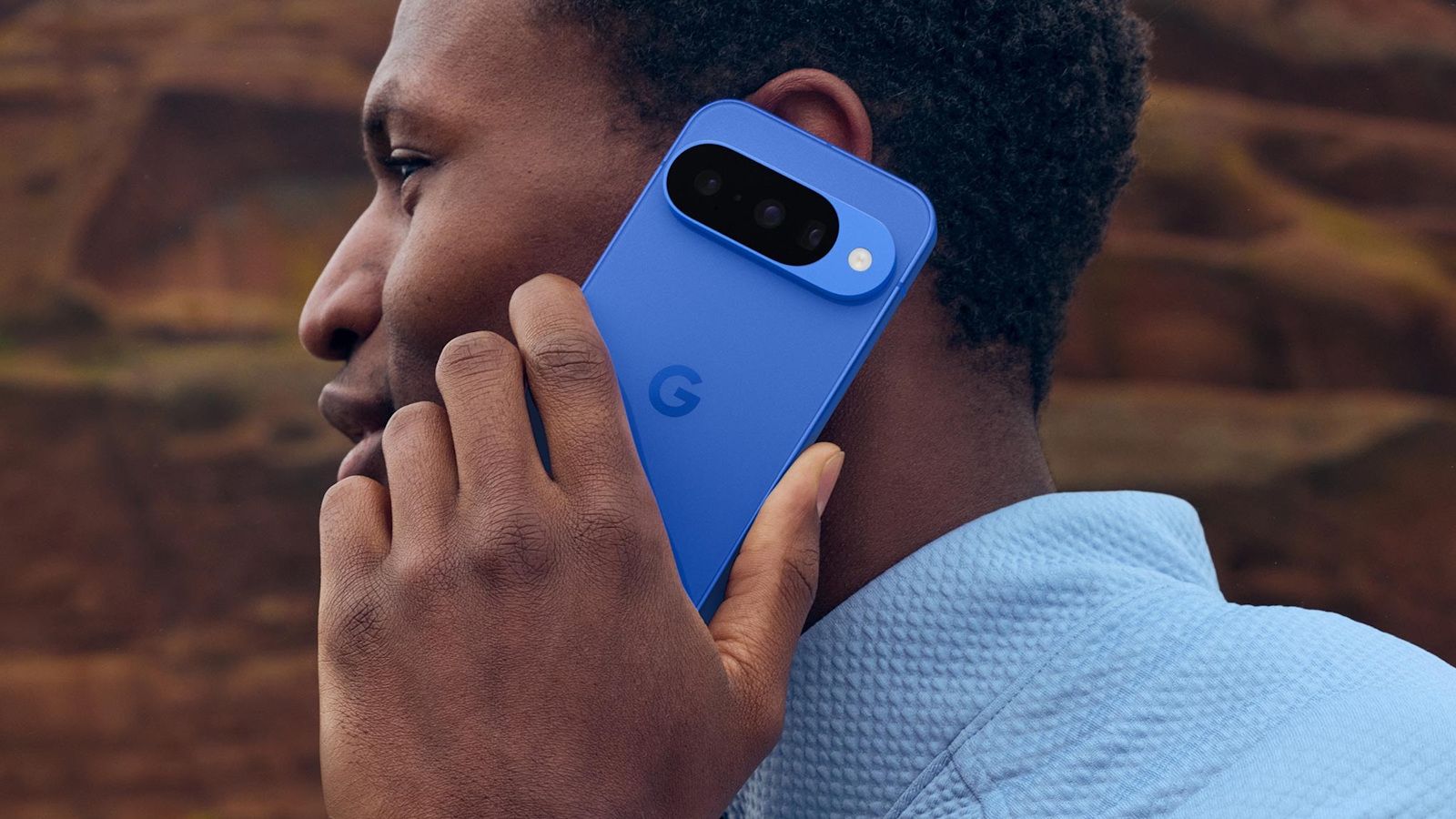 Someone taking calls on the Google Pixel 11