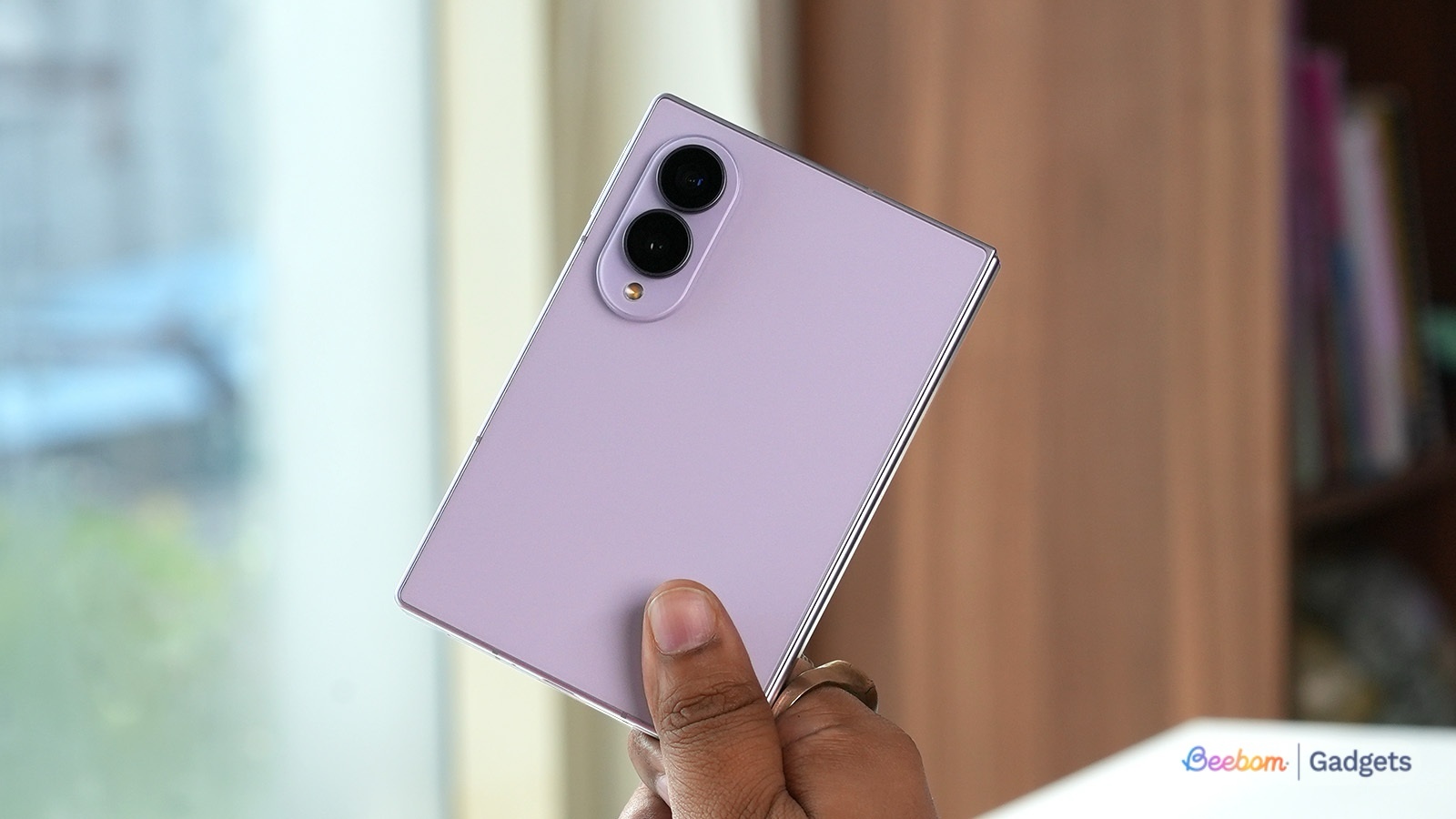 Holding the Galaxy Z Fold 8 in hands sideways when the phone is closed