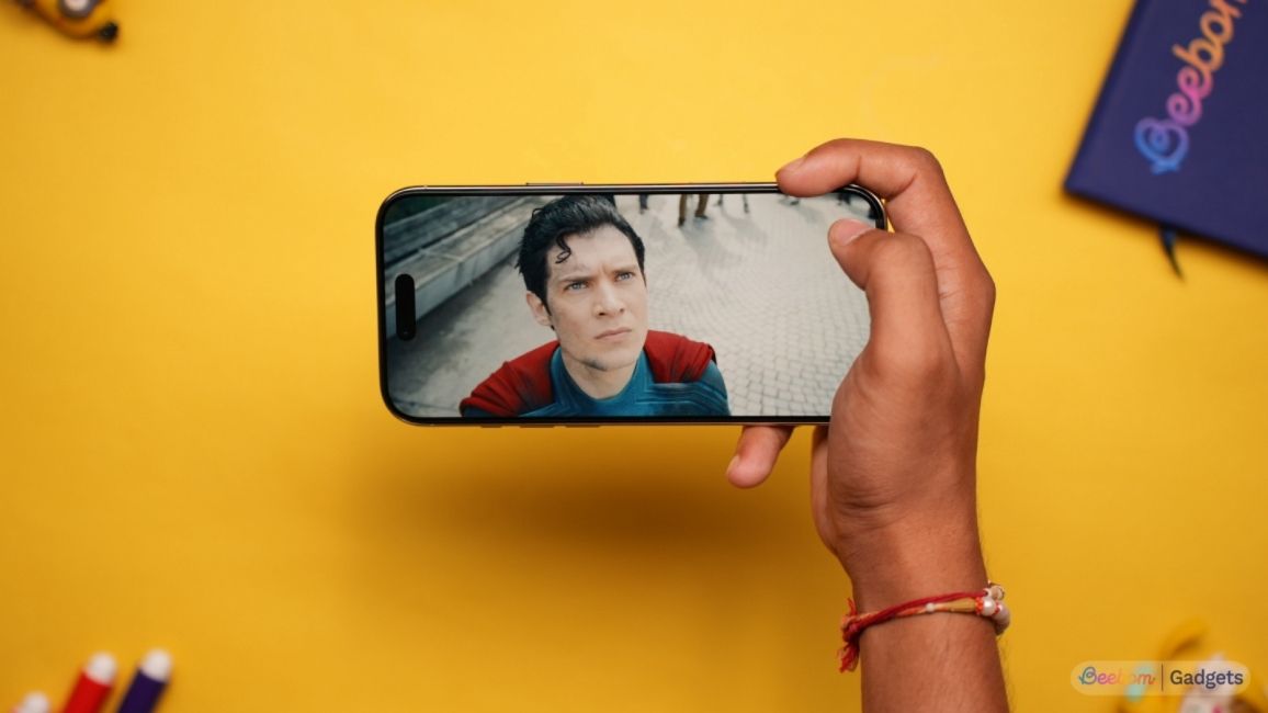 handheld shot of an iPhone Air held in landscape orientation while streaming a movie