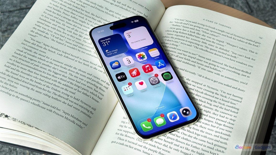 iPhone Air showcased on a book iPhone Air showcased on a book