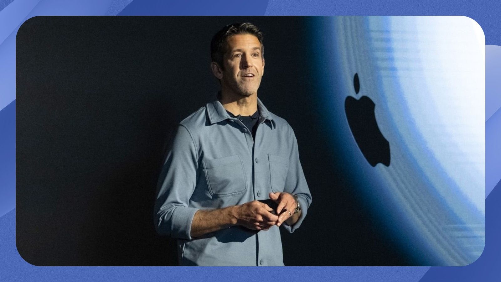 apple ceo john ternus on stage making announcement, apple logo behind