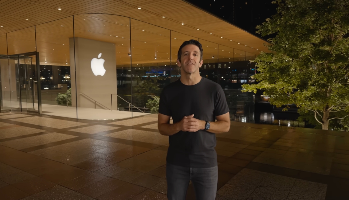 apple ceo john ternus making an announcement, apple logo behind apple ceo john ternus making an announcement, apple logo behind