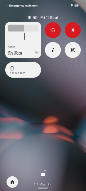 Nothing lock screen with quick setting widgets on atmospheric background