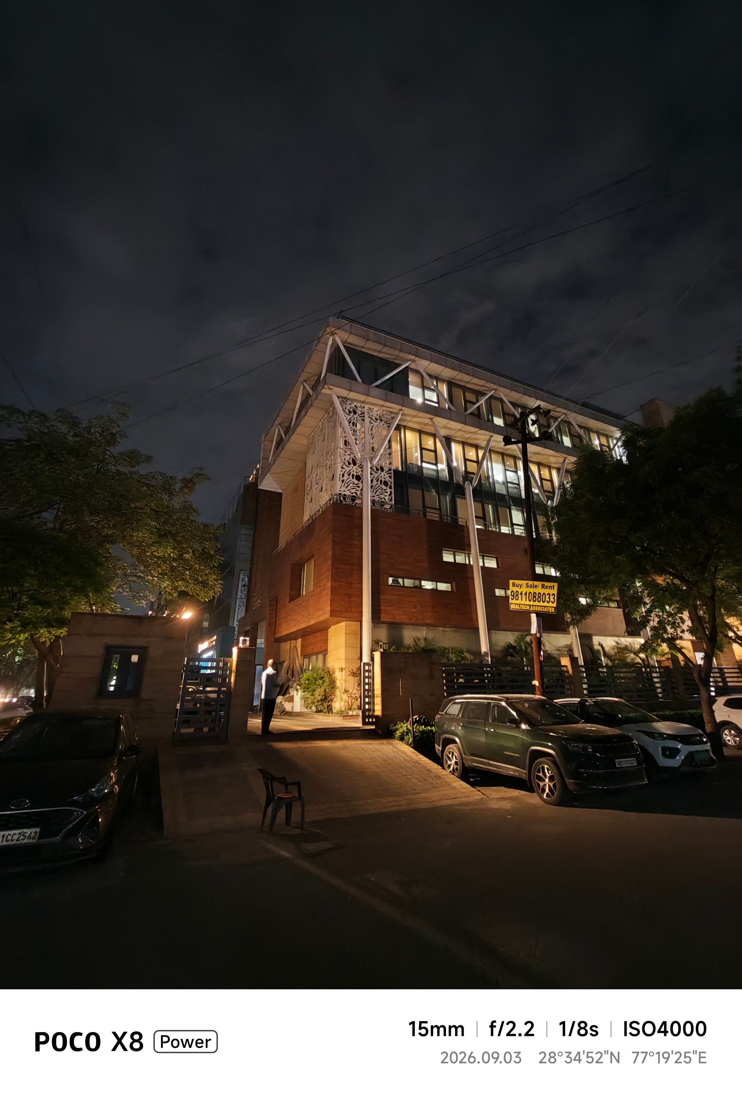 Poco X8 Power building ultrawide shot at night