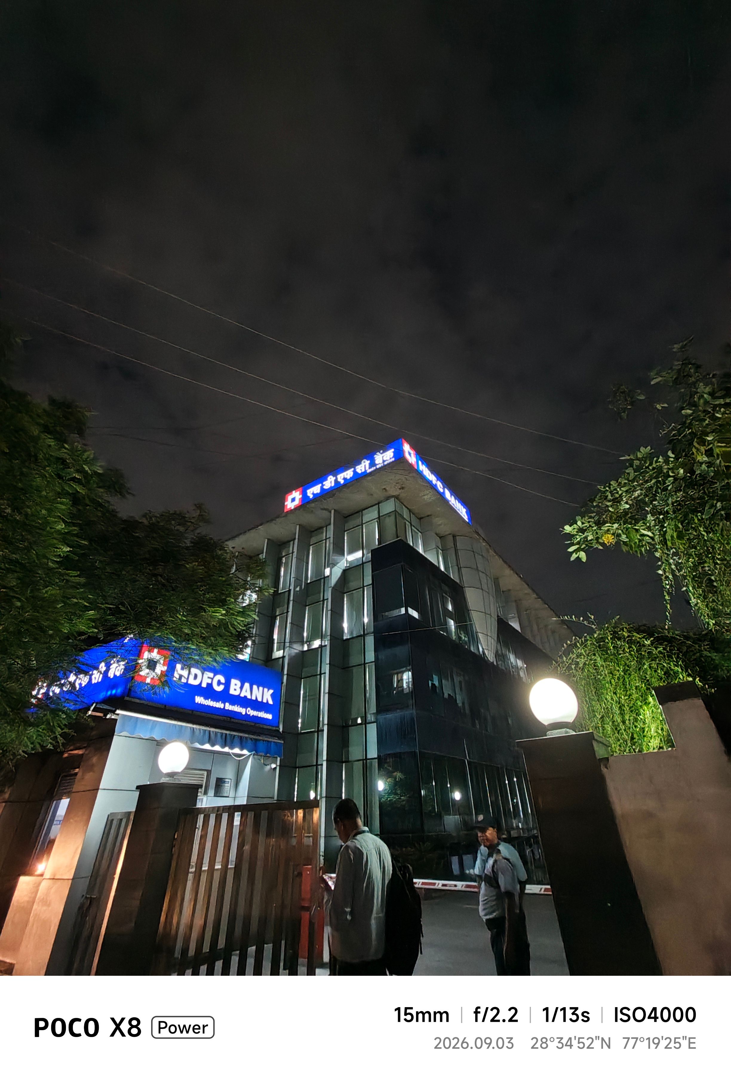 Poco X8 Power building ultrawide shot at night showcasing lights
