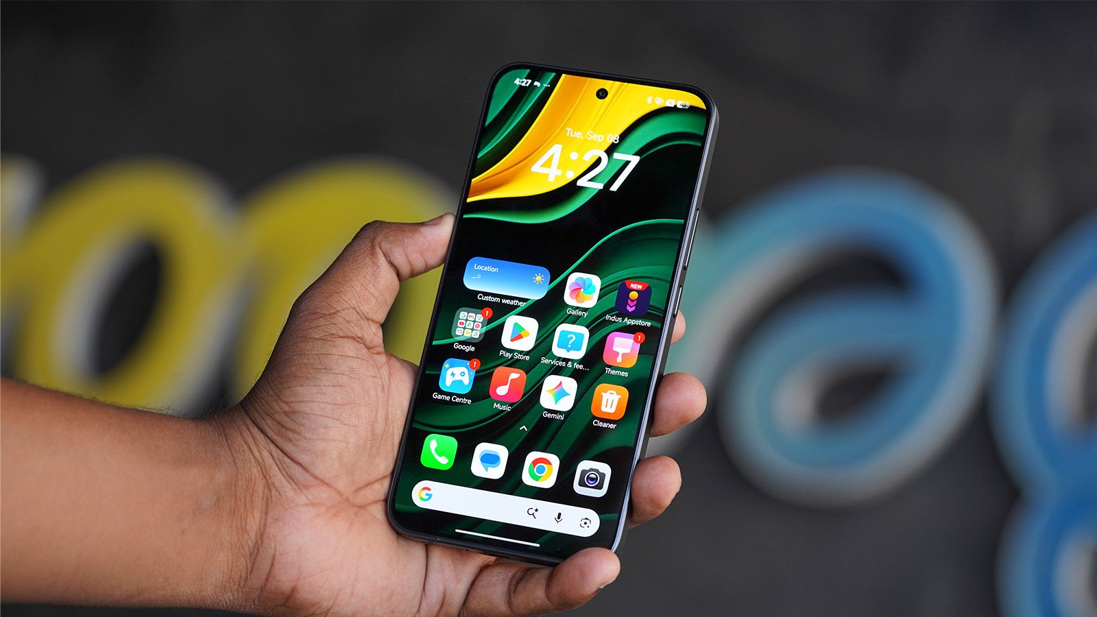 Poco X8 Power display showcased while it's in hand