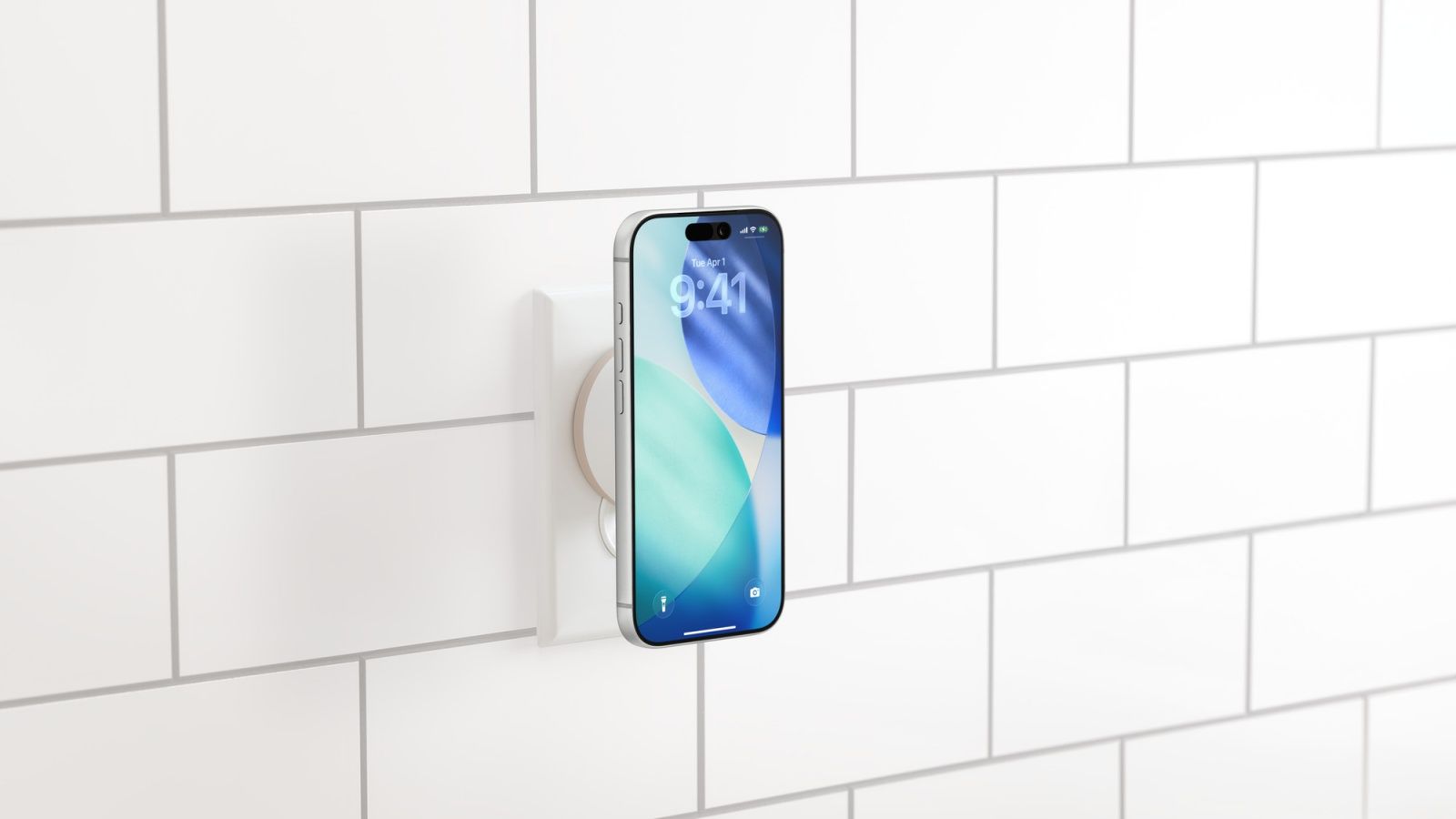 Image of PowerBug wireless charger on the wall with iPhone attached and charging Image of PowerBug wireless charger on the wall with iPhone attached and charging