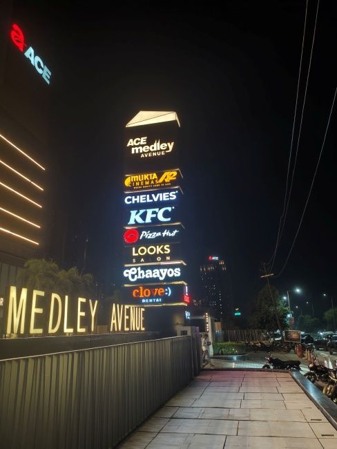 Image of eatery logos shot on Redmi Note 17 Pro Max main camera at night