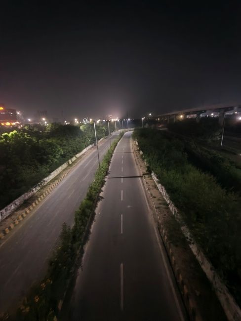 Image of empty highway road shot on Redmi Note 17 Pro max ultra-wide camera at night