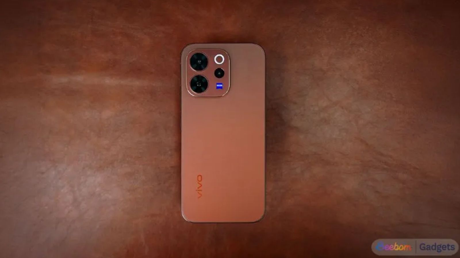 Vivo V70 Elite placed face down on a sofa