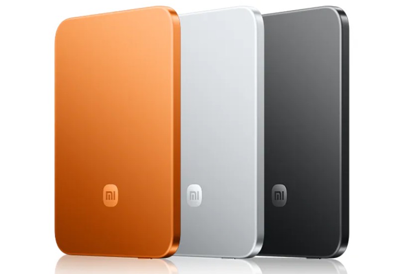 Xiaomi UltraThin Power Bank in orange, silver and black colourways Xiaomi UltraThin Power Bank in orange, silver and black colourways