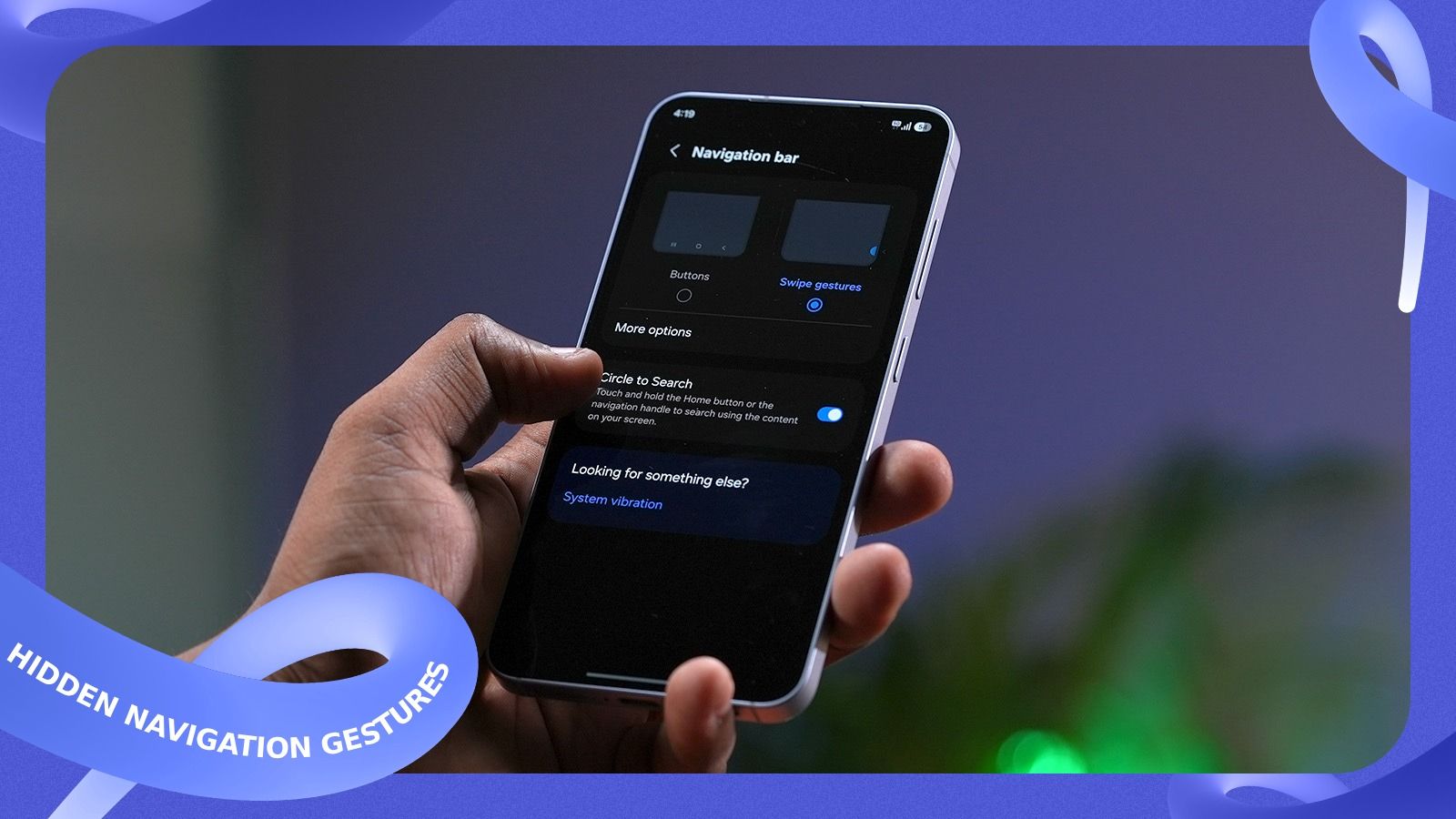 a user holding an android phone and choosing navigation pill gesture option