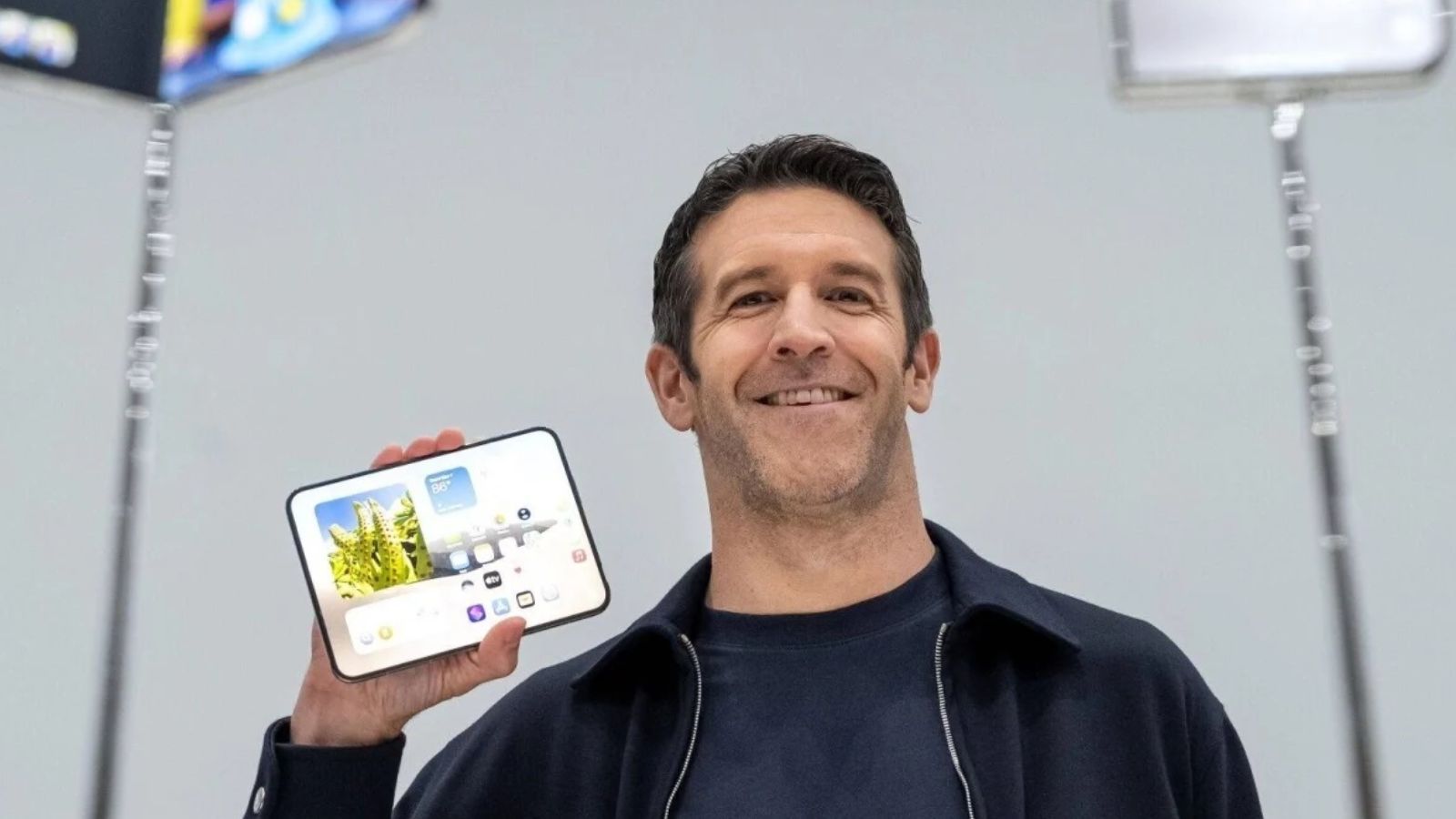 Apple CEO John Ternus showing the iPhone Duo