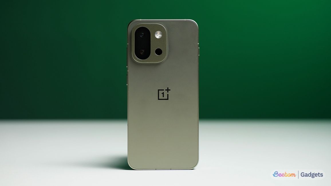 OnePlus 13s upright from the back in green colourway