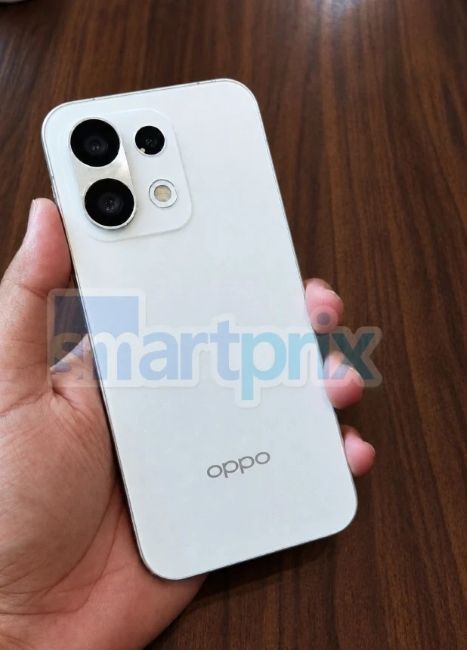 Oppo Reno 17 held in hand in white colourway from the back