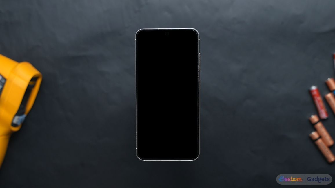 top down shot of a phone with black screen or screen not working