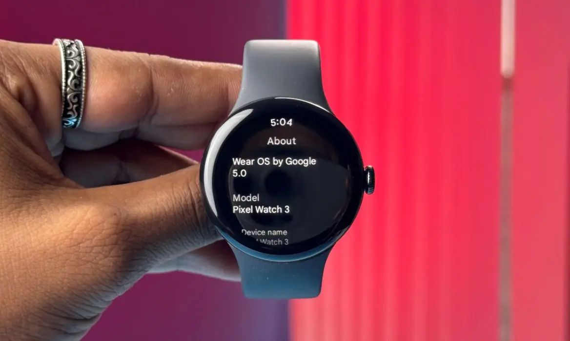 Google Pixel Watch 2 held in hand on Software page