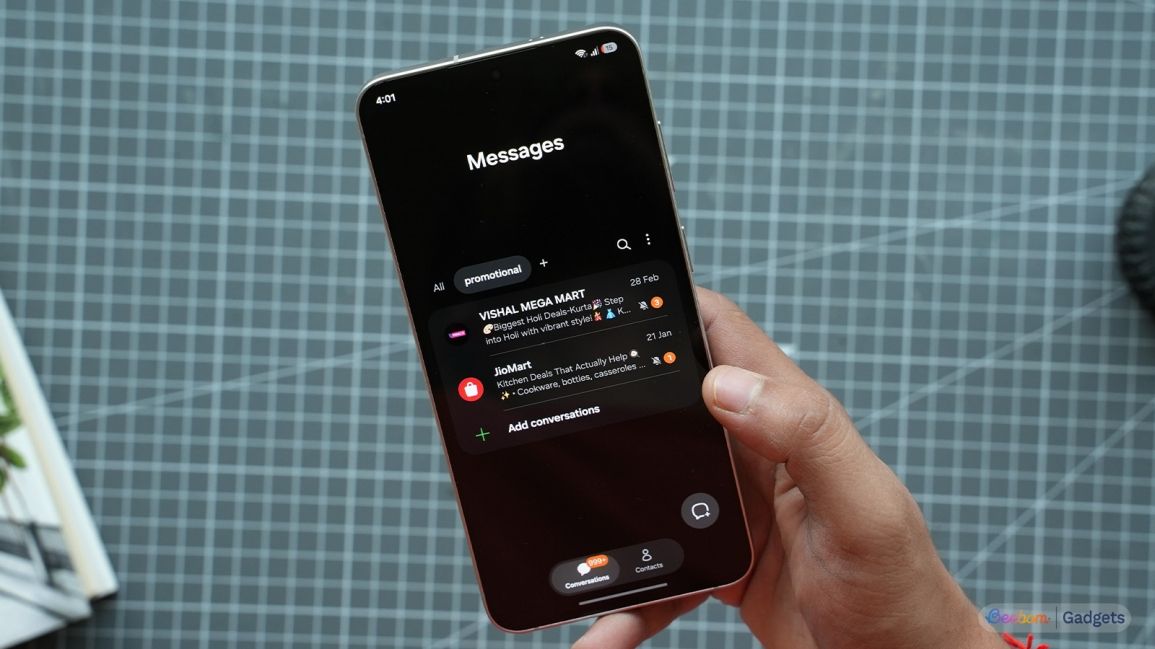 a user holding an android phone showing samsung messages category