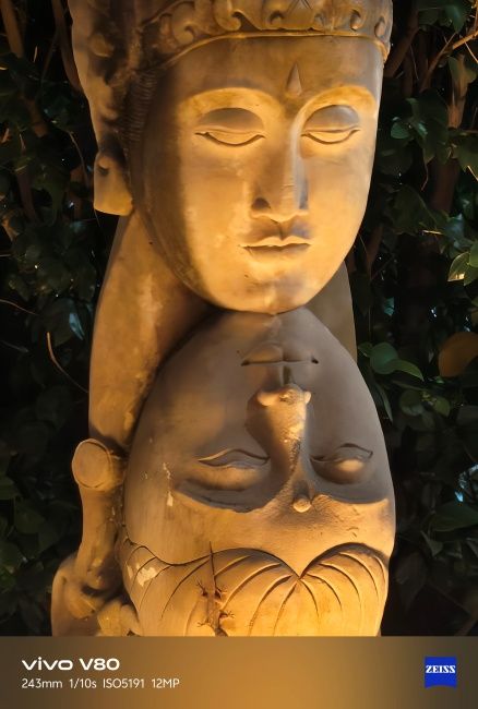 Closeup shot of stone sculpture captured on Vivo V80 telephoto